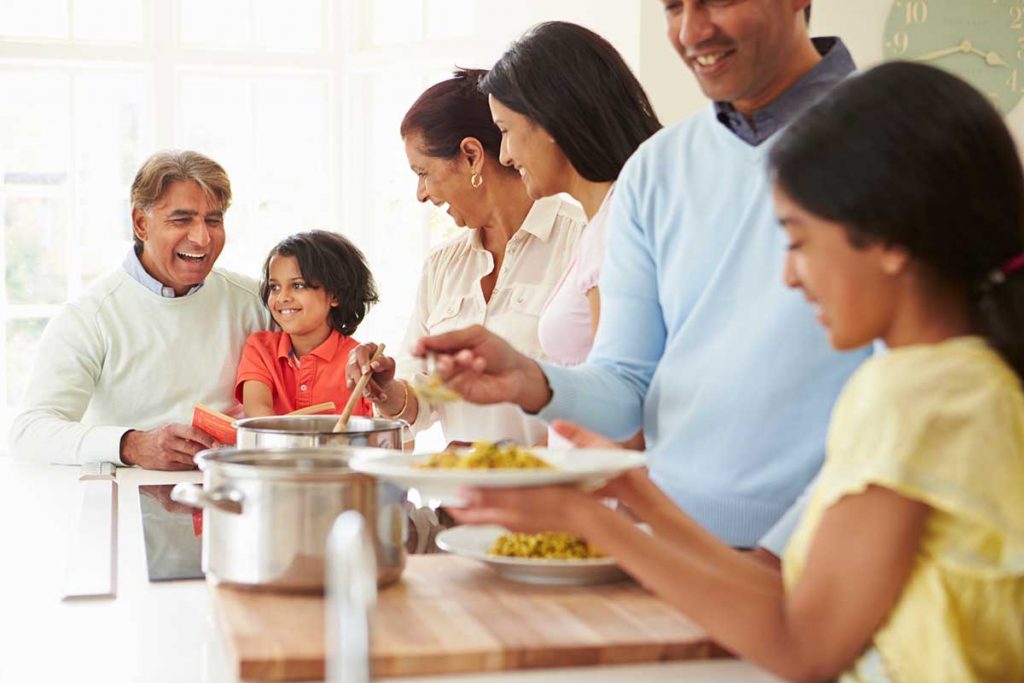 Multi Generational Family Eating Dinner