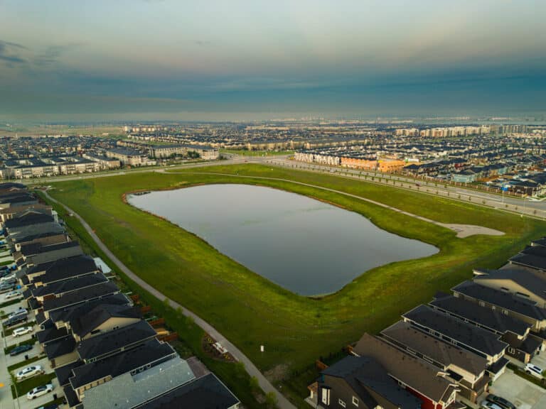 Storm pond and pathways at sunrise in Cornerstone